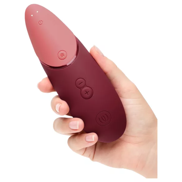 Womanizer Next - klitorālais stimulators ar gaisa viļņiem, uzlādējams, bordo