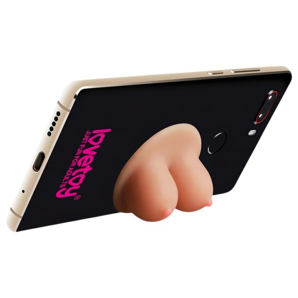 Lovetoy - pie sienas stiprināms telefona turētājs ar krūtiņām (dabīgs)