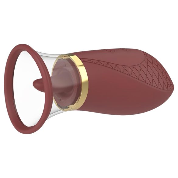 Dreamtoys Roxy - sūkšanas un laizošs vibrators bordo krāsā